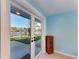 French doors open to a relaxing backyard with water views at 703 Portia N St, Nokomis, FL 34275