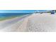 Scenic beach with white sand and shells at 703 Portia N St, Nokomis, FL 34275