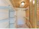 Large closet with wire shelving and wood walls at 703 Portia N St, Nokomis, FL 34275