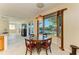 Charming dining area with water views at 703 Portia N St, Nokomis, FL 34275