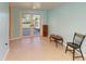 Bright Florida room with access to the backyard and canal view at 703 Portia N St, Nokomis, FL 34275
