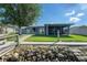 Waterfront home with patio and dock at 703 Portia N St, Nokomis, FL 34275