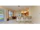 Kitchen boasts granite counters, breakfast bar, and water views at 703 Portia N St, Nokomis, FL 34275
