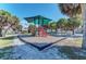 playground with shaded play structures at 703 Portia N St, Nokomis, FL 34275