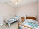 Bedroom with two twin beds, ideal for guests or children at 18069 Ohara Dr, Port Charlotte, FL 33948