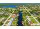 Neighborhood overview showing canal and nearby homes at 18069 Ohara Dr, Port Charlotte, FL 33948