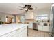 Spacious kitchen with island, stainless steel appliances and view of backyard at 18069 Ohara Dr, Port Charlotte, FL 33948