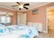 Spacious bedroom with mirrored closet and ensuite bathroom access at 18069 Ohara Dr, Port Charlotte, FL 33948