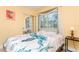 Charming bedroom with a queen-size bed and tiled floors at 18069 Ohara Dr, Port Charlotte, FL 33948