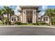 Exterior of community clubhouse with landscaping and inviting entrance at 5221 Laurel Oak Ct, North Port, FL 34287