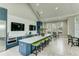 Modern clubhouse kitchen with stainless steel appliances and island at 12196 Alachua Ln, Venice, FL 34293