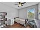 Bedroom with a twin bed and built-in shelving at 12196 Alachua Ln, Venice, FL 34293