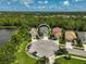 Aerial view of a house in a cul-de-sac neighborhood at 12196 Alachua Ln, Venice, FL 34293