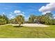 Community volleyball court with sand and net, perfect for recreation at 12196 Alachua Ln, Venice, FL 34293