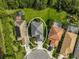 Aerial view of a single-Gathering home in a residential neighborhood at 12196 Alachua Ln, Venice, FL 34293