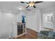 Upstairs loft area with wine cooler and built in shelving at 12196 Alachua Ln, Venice, FL 34293