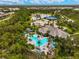 Resort-style pool and clubhouse with surrounding community view at 12196 Alachua Ln, Venice, FL 34293