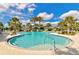 Resort-style pool with a waterslide and lounge area at 12196 Alachua Ln, Venice, FL 34293