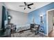 Cozy bedroom with twin bed and rocking chairs at 12196 Alachua Ln, Venice, FL 34293