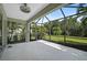 Relaxing screened patio overlooking backyard at 12196 Alachua Ln, Venice, FL 34293