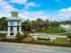 Grand Palm community entrance with lush landscaping and signage at 12196 Alachua Ln, Venice, FL 34293