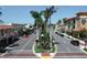 Scenic aerial view of a charming town with palm trees and shops at 200 Gardens Edge Dr # 213, Venice, FL 34285