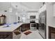 Modern kitchen with stainless steel appliances and an island at 200 Gardens Edge Dr # 213, Venice, FL 34285