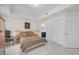 Bright bedroom with a double bed and built-in closet at 200 Gardens Edge Dr # 213, Venice, FL 34285