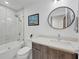 Clean bathroom with tub, shower, and modern vanity at 200 Gardens Edge Dr # 213, Venice, FL 34285