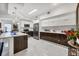 Modern kitchen with stainless steel appliances and an island at 200 Gardens Edge Dr # 213, Venice, FL 34285