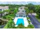 Aerial view of community pool and surrounding area at 200 Gardens Edge Dr # 213, Venice, FL 34285
