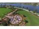 Relaxing fire pit with seating area and landscaping at 19185 Mangieri St, Venice, FL 34293
