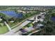 Gated entrance to exclusive community with landscaped entryway and palm trees at 19185 Mangieri St, Venice, FL 34293