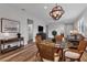 Bright dining area with glass table and wicker chairs at 19185 Mangieri St, Venice, FL 34293