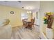 Charming dining area with a round table and built-in hutch at 628 Cervina Dr, Venice, FL 34285