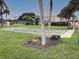 Enjoyable shuffleboard courts nestled amongst lush greenery at 628 Cervina Dr, Venice, FL 34285