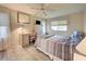 Spacious bedroom with wood-look flooring and plenty of closet space at 628 Cervina Dr, Venice, FL 34285