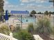 Refreshing community pool with surrounding landscaping and seating at 628 Cervina Dr, Venice, FL 34285