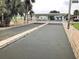 Well maintained bocce ball court with covered seating at 628 Cervina Dr, Venice, FL 34285