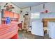 Workshop area with workbench, tools, and storage at 628 Cervina Dr, Venice, FL 34285