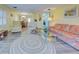 Open living room with a view into the dining area and kitchen at 628 Cervina Dr, Venice, FL 34285
