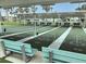 Multiple shuffleboard courts under shaded areas at 628 Cervina Dr, Venice, FL 34285