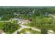 Expansive aerial view of the neighborhood showcasing lush greenery and well-maintained homes at 2197 Nita Ter, North Port, FL 34286