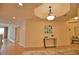 Elegant hallway with tile floors and neutral color palette at 6360 Watercrest Way # 203, Lakewood Ranch, FL 34202