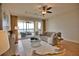 Bright living room with water views and comfortable seating at 6360 Watercrest Way # 203, Lakewood Ranch, FL 34202