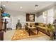 Relaxing lounge area with comfortable seating and a TV at 6360 Watercrest Way # 203, Lakewood Ranch, FL 34202