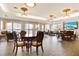 Elegant community room with comfortable seating and lake views at 6360 Watercrest Way # 203, Lakewood Ranch, FL 34202