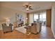 Living room with water views and a tiled floor at 6360 Watercrest Way # 203, Lakewood Ranch, FL 34202