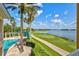 Resort-style pool with lake and golf course views at 6360 Watercrest Way # 203, Lakewood Ranch, FL 34202