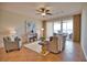 Spacious living room with water views and tiled floors at 6360 Watercrest Way # 203, Lakewood Ranch, FL 34202
